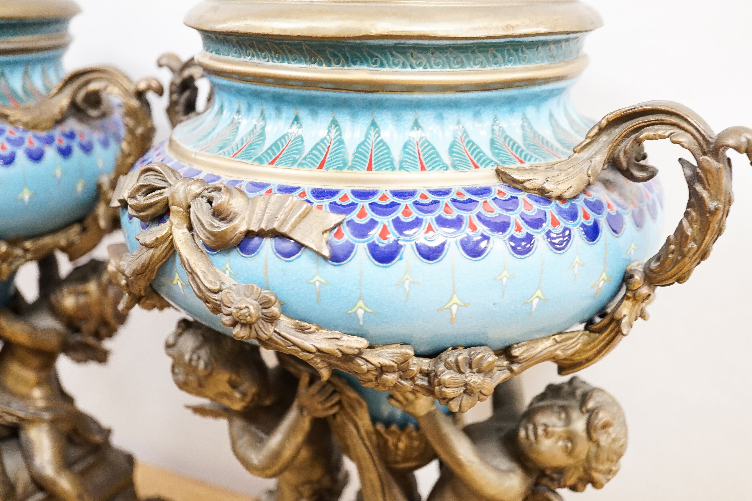 A pair of large ormolu mounted earthenware vases 39cm